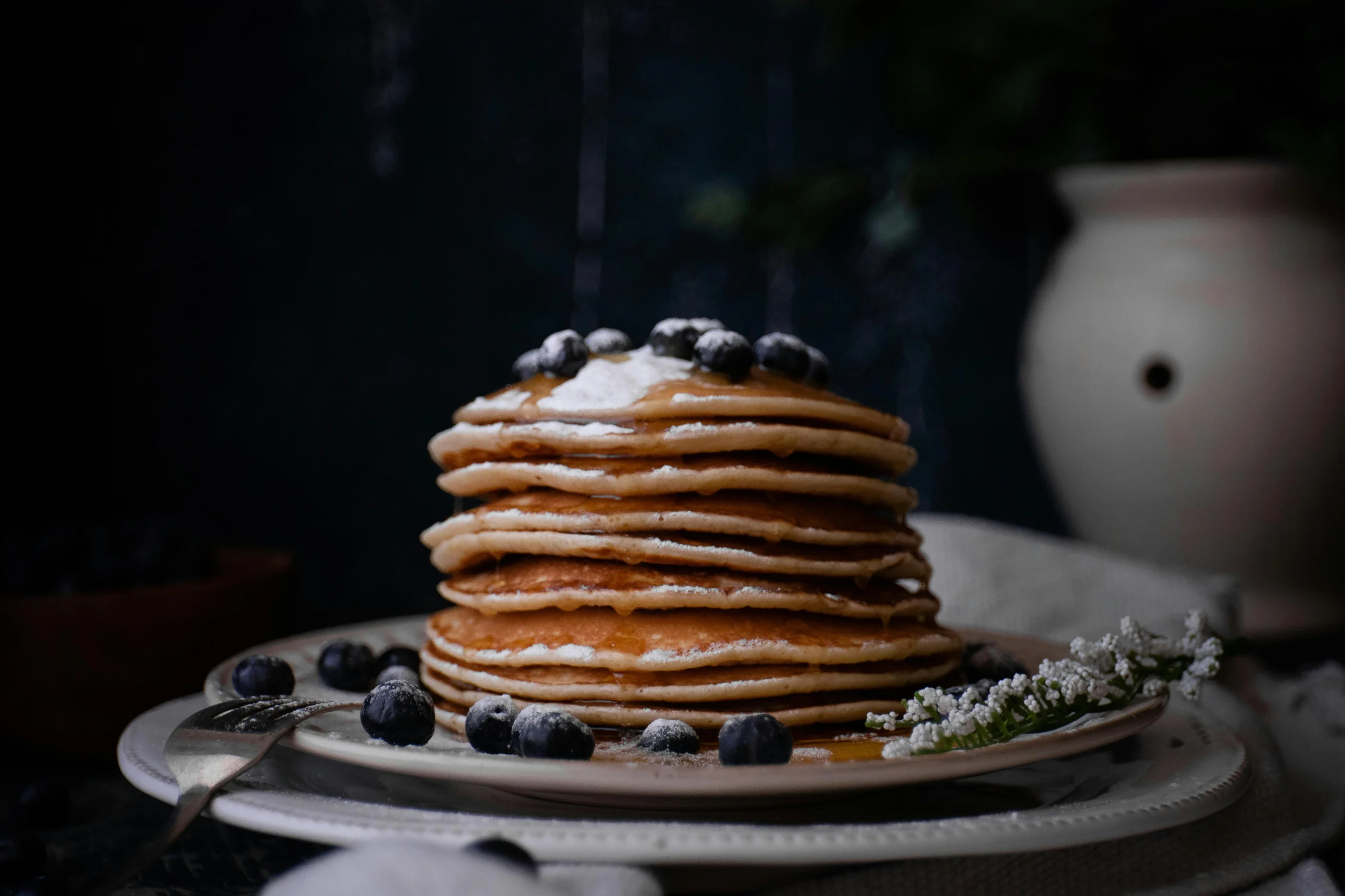 Fluffy homemade pancakes made from a hotcake mix recipe.